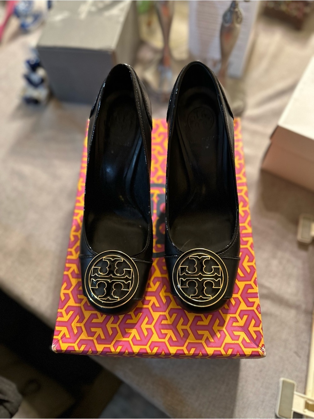 Tory Burch Black Leather Logo Pumps with Gold Medallion